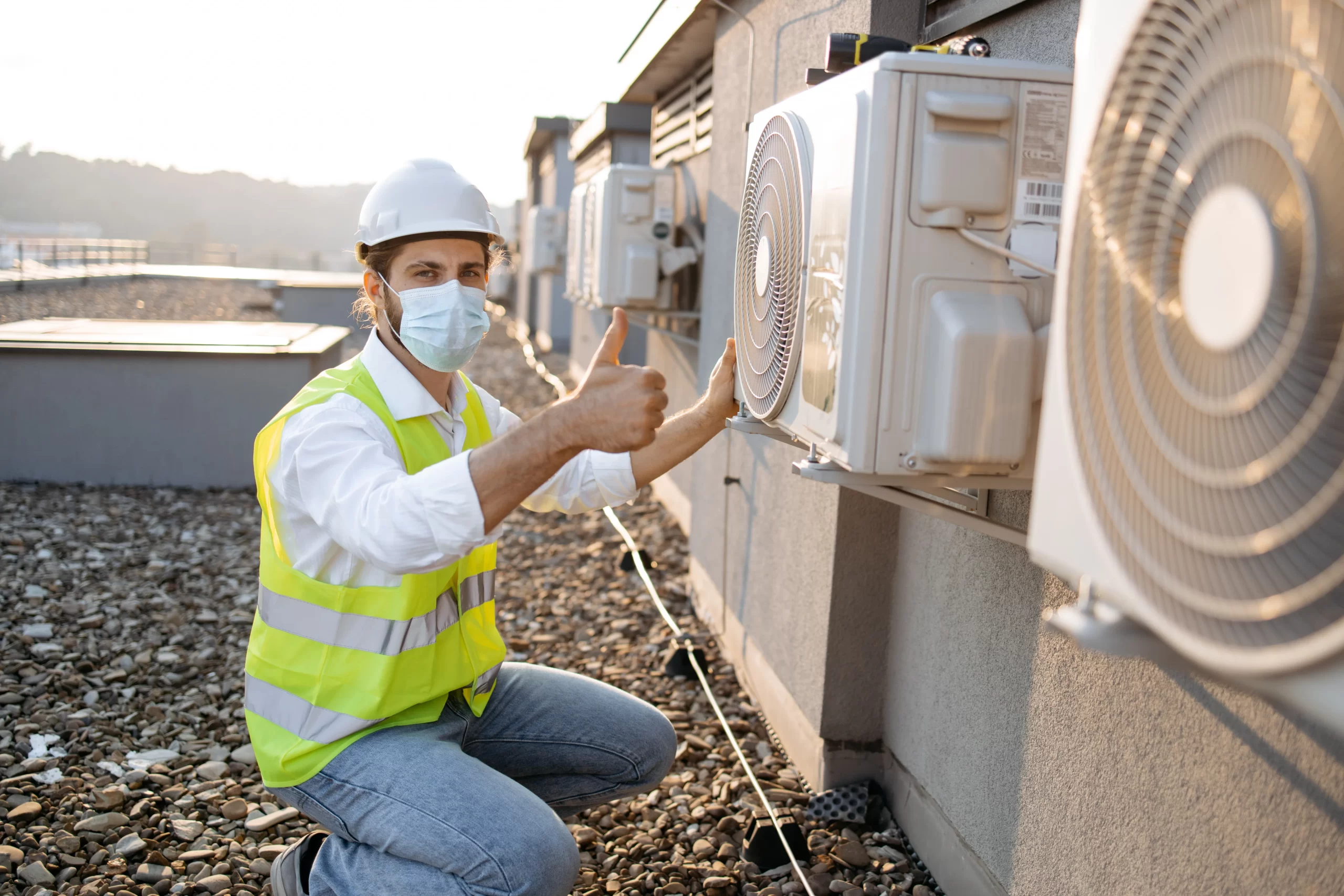 Technician inspecting an air condition system